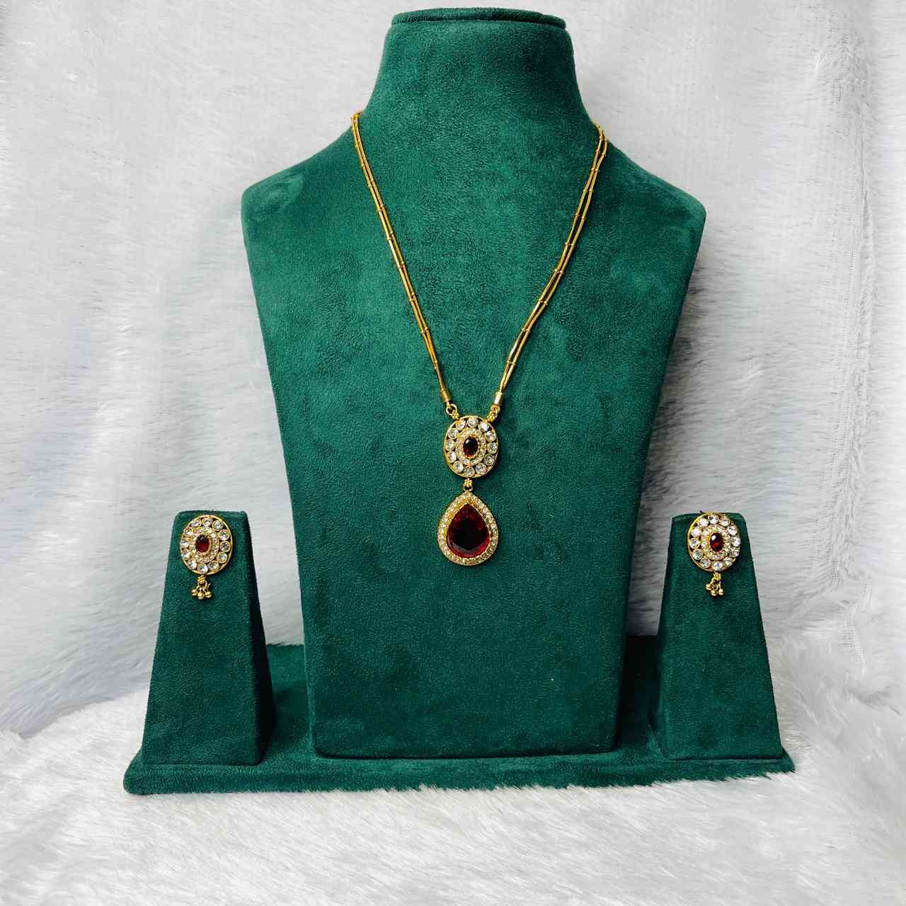 SASC136 GOLD PLATED RUBY PENDANT WITH STUDS